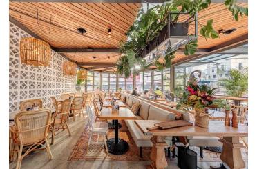 a restaurant with tables and chairs