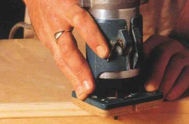 a close-up of a hand using a tool