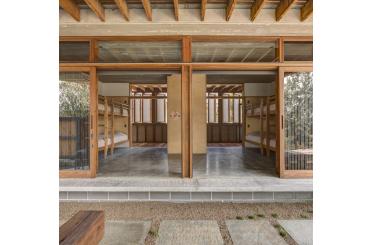 a building with a porch and a patio