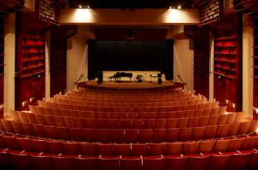 a theater with red seats