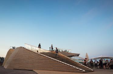 a group of people walking up stairs