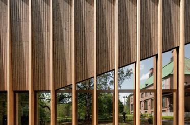 a building with a wood paneled wall