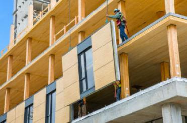 a man standing on a building